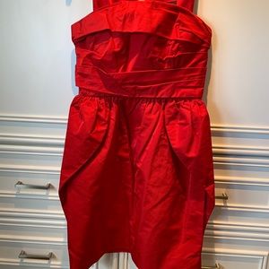 Red Lida Baday dress.